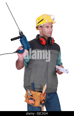 Carpenter posing in studio Banque D'Images