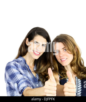Deux belles jeunes femmes showing Thumbs up Banque D'Images