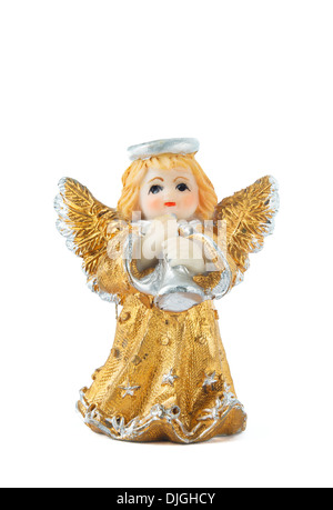 Un peu d'une statue miniature angel colorés avec des ailes et Halo, à jouer de la trompette Banque D'Images