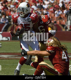 07 sept., 2008 - San Francisco, Californie, États-Unis - San Francisco 49ers vs Arizona Cardinals à Monster Park Dimanche, 07 Septembre, 2008. San Francisco 49ers Shawntae Spencer évoluait et d'utiliser de nouveau Zak Keasey Arizona Cardinals capture wide receiver Steve Breaston pendant le coup d'y retourner. (Crédit Image : © Al/ZUMApress.com) Golub Banque D'Images
