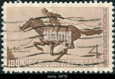 USA - VERS 1960 : un timbre-poste imprimé aux Etats-Unis, Pony Express, numéro du centenaire montre Pony Express Rider, vers 1960 Banque D'Images