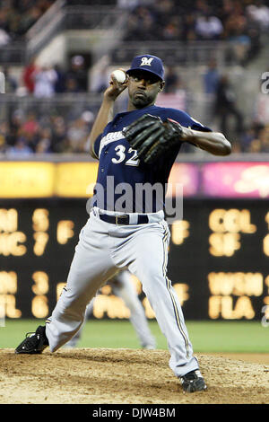 Milwaukee Brewers pitcher LaTroy Hawkins falls as he delivers against the  Minnesota Twins in a baseball game Friday, July 1, 2011 in Minneapolis. (AP  Photo/Andy King Stock Photo - Alamy