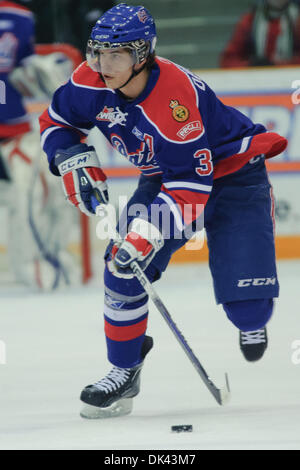 19 mars 2011 - Saskatoon, Saskatchewan, Canada - Joueur de Pats de Regina Brandon Davidson (# 3) joue la rondelle en action pendant la Blades de Saskatoon vs Pats de Regina jeu à Credit Union Centre de Saskatoon. (Crédit Image : © Derek Mortensen/ZUMAPRESS.com) Southcreek/mondial Banque D'Images