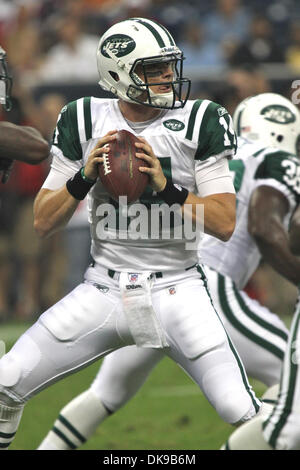 15 août 2011 - Houston, Texas, États-Unis - New York Jets quarterback Greg McElroy(14) Retour à l'adopter. Défait les Texans de Houston New York Jets 20-16 au Reliant Stadium de Houston au Texas. (Crédit Image : © Luis Leyva/ZUMAPRESS.com) Southcreek/mondial Banque D'Images