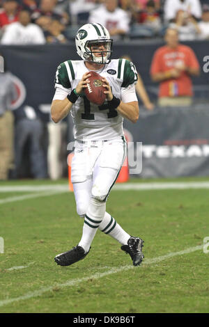 15 août 2011 - Houston, Texas, États-Unis - New York Jets quarterback Greg McElroy(14) Retour à l'adopter. Défait les Texans de Houston New York Jets 20-16 au Reliant Stadium de Houston au Texas. (Crédit Image : © Luis Leyva/ZUMAPRESS.com) Southcreek/mondial Banque D'Images