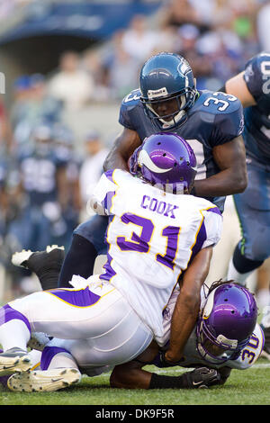 20 août 2011 - Seattle, Washington, États-Unis - Seattle Seahawks running back Leon Washington (33) est abordé par le Minnesota Vikings Chris Cook évoluait (31) et de sécurité Mistral Raymond (30) au champ CenturyLink à Seattle, Washington. La Minnesota Vikings a gagné le match, 20-7. (Crédit Image : © Chris Hunt/ZUMApress.com) Southcreek/mondial Banque D'Images