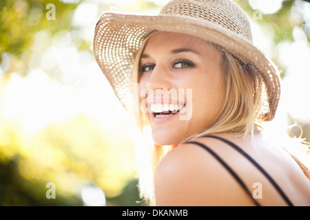 Close up portrait of young woman in park Banque D'Images