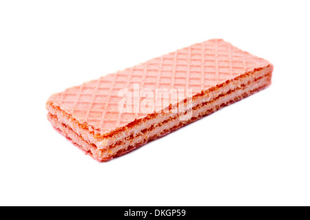 Snack-gaufrette rose sur un fond blanc. Banque D'Images