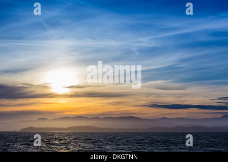 Coucher du soleil sur la côte de Beauport, l'île du Sud, Nouvelle-Zélande, Pacifique Banque D'Images