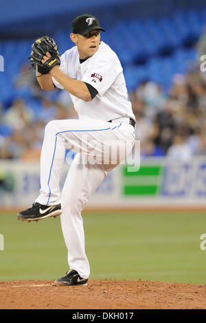 Le 23 juin 2009 - Toronto, Ontario, Canada - 23 juin 2009 : de baseball des Blue Jays de Toronto Shawn Camp (57) en action au cours de la MLB match entre les Blue Jays de Toronto et les Reds de Cincinnati. Les Blue Jays a battu les Reds 7-5, dans le match joué au Centre Rogers de Toronto, ON (crédit Image : © Adrian Gauthier/ZUMApress.com) Southcreek/mondial Banque D'Images