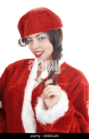 Femme en costume de Père Noël avec un clin et rire sur un fond blanc Banque D'Images