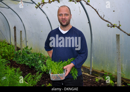 Simon Rogan, chef et propriétaire du restaurant étoilé au Michelin, L'enclume sur sa ferme de Cumbria Banque D'Images