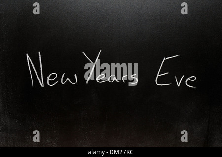 Close up of a blackboard with New Years Eve écrit dessus à la craie. Banque D'Images