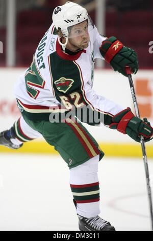 Aile droite Houston Aeros Jean-Michel Daoust (62)prend un coup de poignet dans la première période de jeu. Le Texas Stars défait le Houston Aeros 5 - 2 au Toyota Center de Houston, Texas. (Crédit Image : © Luis Leyva/ZUMApress.com) Southcreek/mondial Banque D'Images