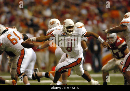 Déc 29, 2004 ; San Antonio, TX, USA ; NCAA Football - Oklahoma States' QB Donovan Woods au cours de l'Alamo Bowl 2004 MasterCard à l'Alamo dome à San Antonio. Banque D'Images