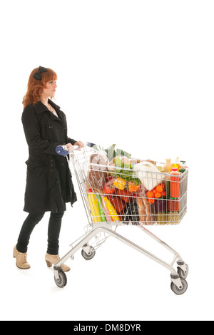 Femme avec panier avec plein de produits laitiers isolated over white background Banque D'Images