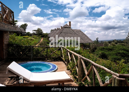 La chambre à coucher d'un Exploreans Ngorongoro Lodge, près de l'aire de conservation de Ngorongoro en Tanzanie Afrique de l'Est Banque D'Images