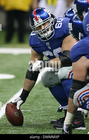 18 Octobre 2009 : Giants center, Shaun O'Hara (60) communique avec son activité au cours de l'action de jeu entre les Giants de New York et les New Orleans Saints dans le Louisiana Superdome. (Crédit Image : © Global/ZUMApress.com) Southcreek Banque D'Images