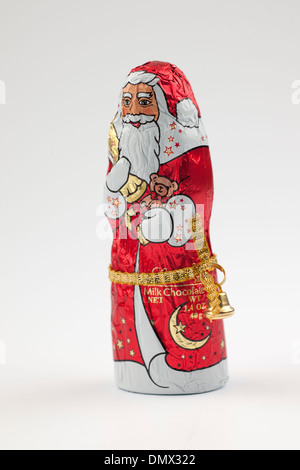 Père Noël en chocolat au lait d'aluminium Banque D'Images