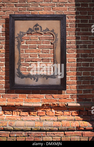 Vintage cadre sur l'ancien mur de brique marron Banque D'Images