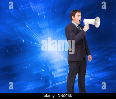 Image composite de standing businessman shouting through a megaphone Banque D'Images