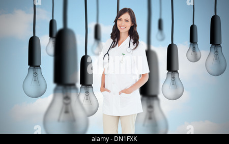 Image composite de confiant et libre debout devant la fenêtre Banque D'Images