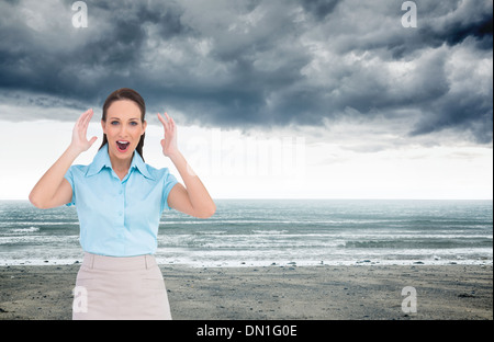Composite image élégant businesswoman posing Banque D'Images