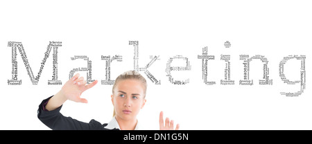 Composite image of businesswoman pointing Banque D'Images