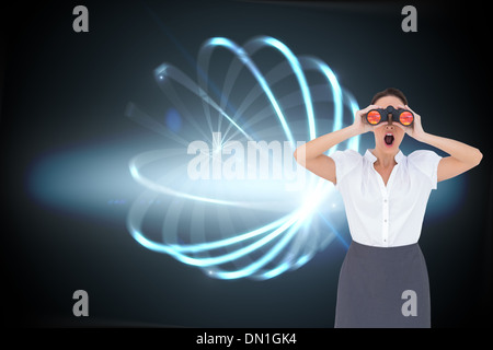 Composite image of businesswoman looking through binoculars Banque D'Images