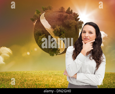 Composite image of businesswoman posing Banque D'Images