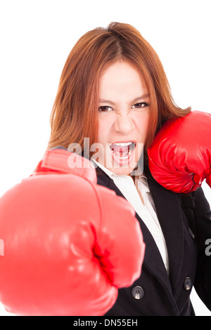 Businesswoman boxing punching vers et prêt à se battre Banque D'Images