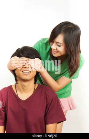 Happy young couple in white background Banque D'Images