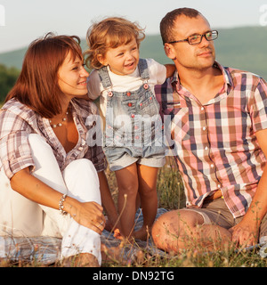 Happy Family having fun outdoors and smiling Banque D'Images
