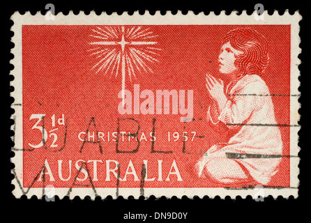 Australie - VERS 1957 : un timbre imprimé en Australie à partir de la question de Noël montre l'esprit de Noël, vers 1957. Banque D'Images