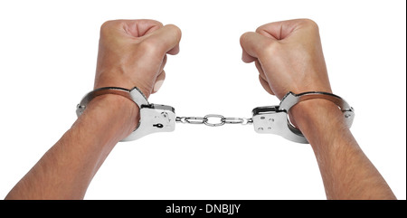 Les mains dans les menottes isolé sur fond blanc Banque D'Images