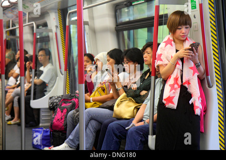 Hong Kong Chine,HK,Asie,Chinois,Oriental,Hong Kong MTR Subway,Airport Express,à bord,cabine passager,train,cabine passager,transport passagers Banque D'Images