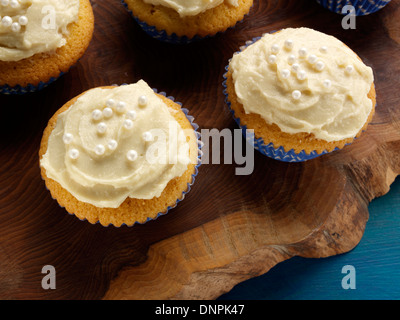 Glaçage sur les cupcakes Banque D'Images