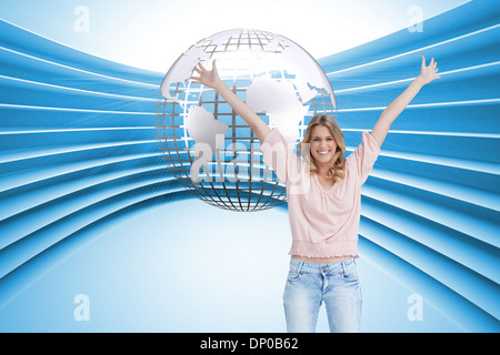 Composite image of a smiling woman with her arms raised up Banque D'Images