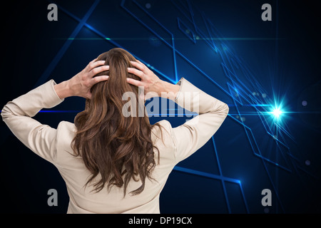 Composite image of Asian businessman with hands on head standing back to camera Banque D'Images