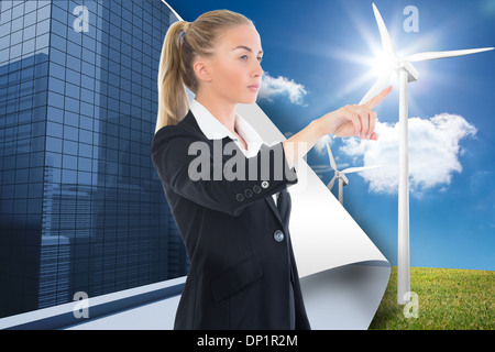 Composite image of businesswoman pointing Banque D'Images