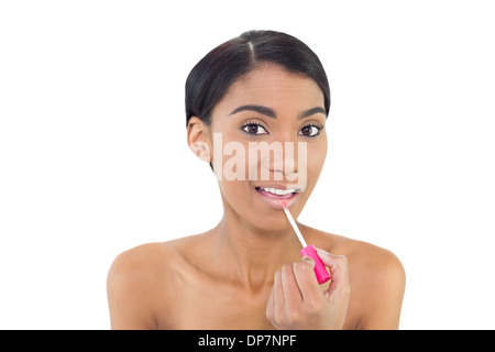 Joli modèle naturel d'appliquer le rouge à lèvres brillant Banque D'Images