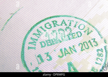 Contrôle de l'immigration ; fragment de timbres de passeport l'accent sur l'Immigration word Banque D'Images