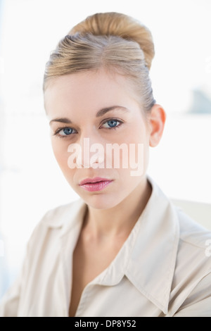 Young blonde woman looking at camera Banque D'Images