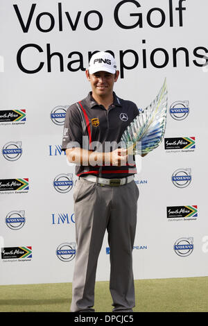 Durban, Afrique du Sud, le 12 janvier 2014. Golfeur sud-africain Louis Oosthuizen conserve son trophée après avoir remporté le tournoi des champions de golf Volvo qui a eu lieu à la Durban Country Club. Credit : Giordano Stolley/Alamy Live News Banque D'Images