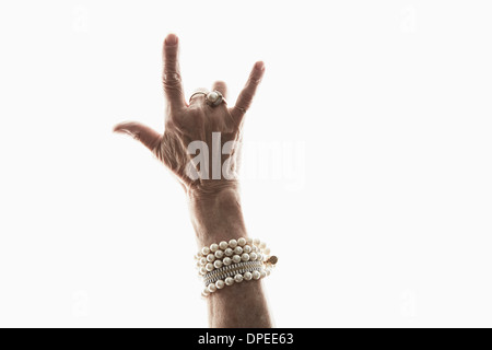 Studio shot of young woman's hand geste décisionnel Banque D'Images