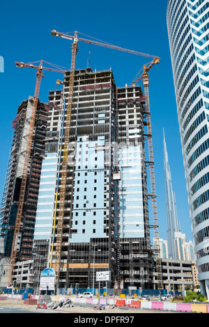 De nouveaux gratte-ciel en construction à de nouvelles affaires et résidentiel commercial Bay à Dubaï Émirats Arabes Unis Banque D'Images