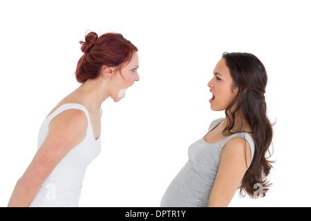 Angry young female friends having an argument Banque D'Images