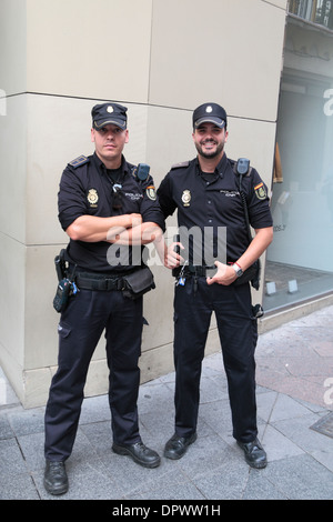 Deux policiers de la Force nationale de Police (Policia Cuerpo Nacional de Policía ou CNP) Séville (Séville), Andalousie, espagne. Banque D'Images