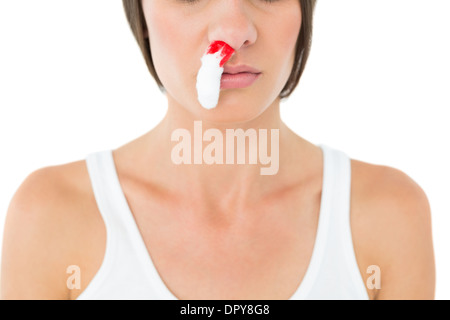 Close-up of a young woman avec saignement du nez Banque D'Images