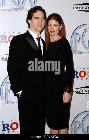 Jan 24, 2009 - Hollywood, Californie, USA - Actrice Debra Messing & Mari DANIEL ZELMAN arrivant à la 20e édition du Gala des Prix de la Guilde des producteurs au Hollywood Palladium. (Crédit Image : © Lisa O'Connor/ZUMA Press) Banque D'Images